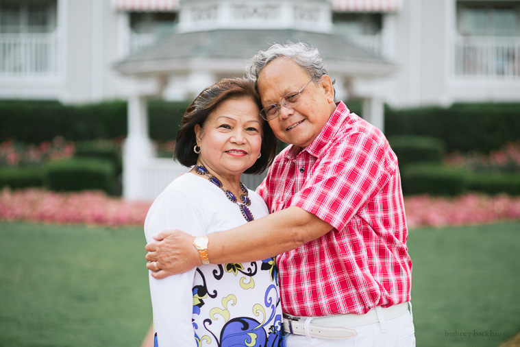 older couple hugging at Disney world photographer session