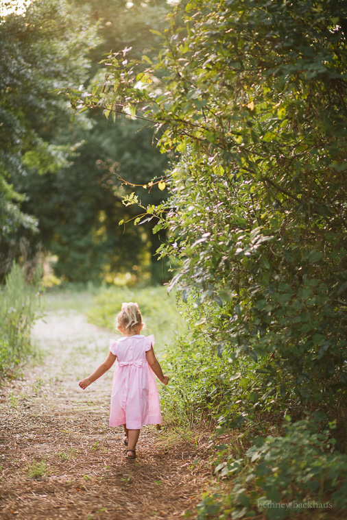 Little girl on sunlit trail Orlando